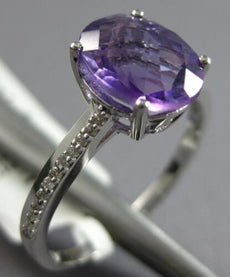 1.82CT DIAMOND & AAA AMETHYST 18KT WHITE GOLD OVAL & ROUND FRIENDSHIP LOVE RING