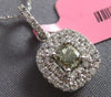.75CT WHITE & FANCY GREEN DIAMOND 18KT WHITE GOLD PRINCESS & ROUND HALO PENDANT