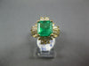 ESTATE 3.20CT DIAMOND & AAA EMERALD 18KT WHITE GOLD ROUND & BAGUETTE FLOWER RING