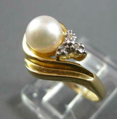 ESTATE .05CT DIAMOND & AAA SOUTH SEA PEARL 14K YELLOW GOLD DOUBLE SWIRL FUN RING