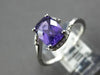 1.67CT DIAMOND & AAA AMETHYST 14KT WHITE GOLD CUSHION & ROUND CRISS CROSS RING