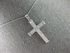 .45CT DIAMOND 14KT WHITE GOLD 3D ROUND & BAGUETTE 3 ROW CROSS FLOATING PENDANT