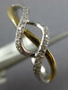 ESTATE .06CT DIAMOND 14KT WHITE AND YELLOW GOLD 3D CLASSIC INFINITY LOVE RING