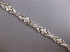 ESTATE 14KT WHITE GOLD 3D CLASSIC MATTE & SHINY MULTI FLOWER XO BRACELET
