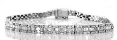 2.26CT DIAMOND 18KT WHITE GOLD ROUND & BAGUETTE SEMI ETERNITY PANTHER BRACELET