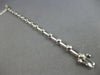 ESTATE .56CT DIAMOND 14K WHITE GOLD ROUND BEZEL BY THE YARD LOVE TENNIS BRACELET