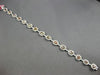 LARGE GIA 6.56CT MULTI COLOR DIAMOND 18KT WHITE & ROSE GOLD HALO TENNIS BRACELET