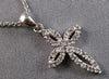 ESTATE SMALL .11CT DIAMOND 14KT WHITE GOLD 3D FLORAL CROSS FLOATING PENDANT