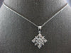 .81CT DIAMOND 18KT WHITE GOLD ROUND BAGUETTE & PRINCESS SQUARE FLOATING PENDANT