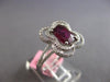 1.83CT DIAMOND & AAA RUBY 18KT WHITE GOLD OVAL & ROUND 4 LEAF CLOVER FLOWER RING