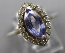 1.11CT DIAMOND & AAA TANZANITE 14KT WHITE GOLD MARQUISE & ROUND ENGAGEMENT RING