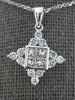 ESTATE .61CT DIAMOND 18KT WHITE GOLD ROUND & PRINCESS SNOWFLAKE FLOATING PENDANT