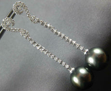 LARGE .52CT DIAMOND & AAA TAHITIAN PEARL 18KT WHITE GOLD SWIRL HANGING EARRINGS