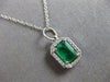 1.25CT DIAMOND & AAA EMERALD 14KT WHITE GOLD ROUND & SQUARE HALO OCTAGON PENDANT