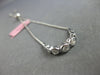 .34CT DIAMOND 14KT WHITE GOLD 7 STONE GRADUATING BEZEL ADJUSTABLE LOVE BRACELET