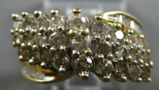1.40CT DIAMOND 14KT 2 TONE GOLD 3D ROUND AND BAGUETTE MULTI ROW CRISS CROSS RING