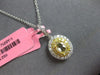 1.51CT WHITE & FANCY YELLOW DIAMOND 18K 2 TONE GOLD 3D OVAL & ROUND HALO PENDANT