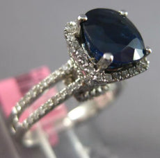 4.82CT DIAMOND & AAA SAPPHIRE 18KT WHITE GOLD OVAL & ROUND HALO ENGAGEMENT RING
