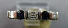 .30CT DIAMOND AND AAA SAPPHIRE 14KT WHITE GOLD ROUND & BAGUETTE ANNIVERSARY RING