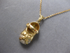 ESTATE .12CT DIAMOND 14KT 2 TONE GOLD 3D FLORAL BABY GIRL SHOE FLOATING PENDANT