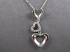 .06CT DIAMOND 14KT WHITE GOLD 3D OPEN HEART JOURNEY PAST PRESENT FUTURE PENDANT