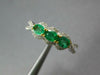 .91CT DIAMOND & AAA EMERALD 18KT 2 TONE GOLD OVAL & ROUND 3 STONE HALO LOVE RING