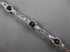 7.67CT DIAMOND & AAA GARNET 14KT WHITE GOLD 3D CUSHION & ROUND TENNIS BRACELET