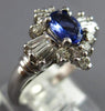 1.12CT DIAMOND & AAA TANZANITE 14K WHITE GOLD 3D OVAL & BAGUETTE ENGAGEMENT RING