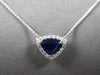 2.17CT DIAMOND & AAA SAPPHIRE 18K WHITE GOLD TRILLION & ROUND HALO LOVE NECKLACE