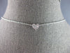 .12CT DIAMOND 14K WHITE GOLD ROUND & BAGUETTE INVISIBLE HEART SHAPE LOVE PENDANT
