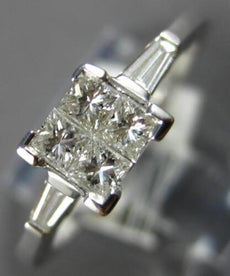 .50CT DIAMOND 18KT WHITE GOLD PRINCESS & BAGUETTE 3D INVISIBLE ENGAGEMENT RING