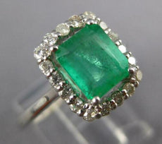 2.16CT DIAMOND & AAA EMERALD 14KT WHITE GOLD 3D ROUND & BAGUETTE ENGAGEMENT RING