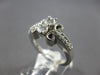 ESTATE .59CT DIAMOND 14KT WHITE GOLD ROUND 2 STONE INFINITY FILIGREE LOVE RING