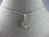 ESTATE .67CT DIAMOND 18KT WHITE GOLD 3D ROUND & BAGUETTE SQUARE FLOATING PENDANT