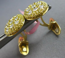 1.84CT WHITE & INTENSE FANCY YELLOW DIAMOND 18KT YELLOW GOLD CIRCULAR CUFFLINKS