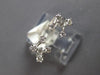 ESTATE .26CT DIAMOND 14KT WHITE GOLD ETOILE DOUBLE FLOWER TENSION FUN LOVE RING