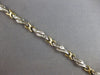 LONG 1.02CT DIAMOND 14KT 2 TONE GOLD BAGUETTE MULTI LEAF X LOVE TENNIS BRACELET