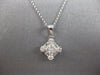 ESTATE .67CT DIAMOND 18KT WHITE GOLD 3D ROUND & BAGUETTE SQUARE FLOATING PENDANT