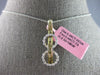 .70CT WHITE & FANCY YELLOW DIAMOND 18KT 2 TONE GOLD ROUND & BAGUETTE 3D PENDANT