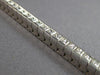 ESTATE 5.42CT DIAMOND 14KT WHITE GOLD PRINCESS CHANNEL INVISIBLE TENNIS BRACELET