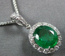 2.03CT DIAMOND & AAA EMERALD 18KT WHITE GOLD OVAL & ROUND HALO FLOATING PENDANT