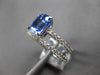 1.51CT DIAMOND & AAA SAPPHIRE 18KT WHITE GOLD BAGUETTE & ROUND ENGAGEMENT RING
