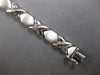 ESTATE WIDE 14KT WHITE GOLD 3D CLASSIC MATTE & SHINY XO LOVE BRACELET