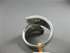 ESTATE WIDE 1.39CT DIAMOND & RUBY 14KT WHITE GOLD ETOILE CRISS CROSS SNAKE RING