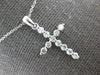 ESTATE .52CT DIAMOND 14K WHITE GOLD 3D ROUND SHARED PRONG CROSS FLOATING PENDANT