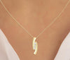 .25CT DIAMOND 14KT YELLOW GOLD 3 STONE CRISS CROSS PAST PRESENT FUTURE PENDANT