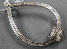 1.37CT DIAMOND 14KT WHITE GOLD ROUND & BAGUETTE OPEN TEAR DROP FLOATING PENDANT
