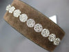 1.53CT DIAMOND 18KT WHITE GOLD INVISIBLE FLOWER ADJUSTABLE LOVE TENNIS BRACELET