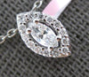 .22CT DIAMOND 14KT WHITE GOLD ROUND & MARQUISE HALO SOLITAIRE FLOATING PENDANT