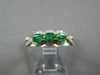 .91CT DIAMOND & AAA EMERALD 18KT 2 TONE GOLD OVAL & ROUND 3 STONE HALO LOVE RING